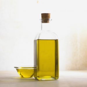 Bottle and bowl of oil